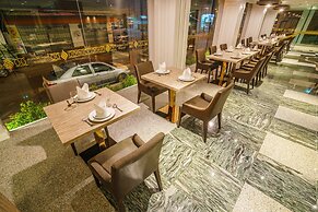 New Season Square Hotel