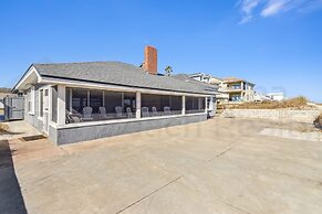 Charming Oceanfront Beach House by RedAwning