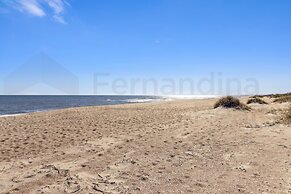 Charming Oceanfront Beach House by RedAwning