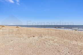 Charming Oceanfront Beach House by RedAwning