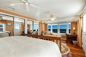 Rustic Ocean Front Cottage by RedAwning