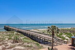Upper unit Overlooking the Beautiful Outdoor Space and Pier by RedAwni