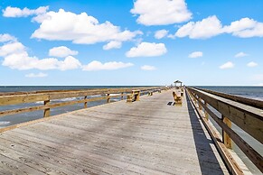 Upper unit Overlooking the Beautiful Outdoor Space and Pier by RedAwni
