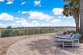 Upper unit Overlooking the Beautiful Outdoor Space and Pier by RedAwni