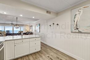 Upper Unit Condo Overlooking Both the Ocean Pier and Swimming Pool by 