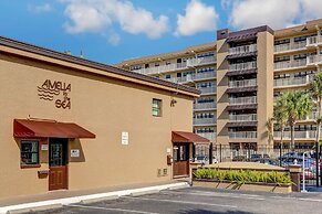 Upper Unit Condo Overlooking Both the Ocean Pier and Swimming Pool by 