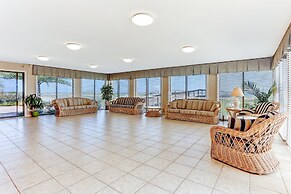 Comfy Upper Unit Condo to Enjoy the Beach or the Fishing by RedAwning