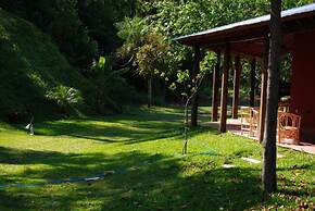 Rio Arriba Suites Apartments y Resto