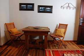 Rio Arriba Suites Apartments y Resto