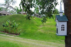 Rio Arriba Suites Apartments y Resto