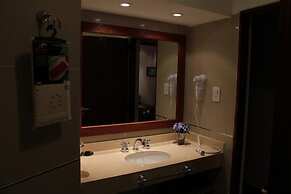 Rio Arriba Suites Apartments y Resto