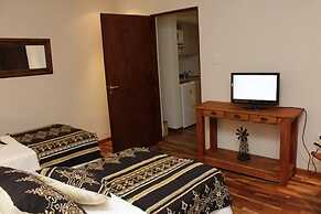 Rio Arriba Suites Apartments y Resto