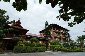 Teak Wood Hotel