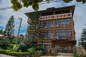 Teak Wood Hotel