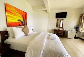 Sunset at Aninuan Beach Resort powered by Cocotel
