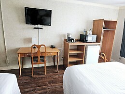 Claymore inn & Suites