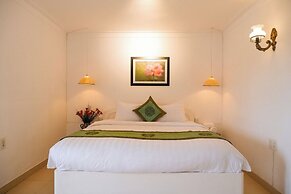 Purple Hue Charming Riverside Hotel