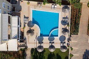 Elea Suites & Residences