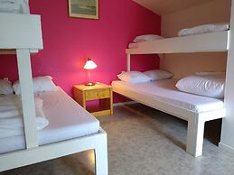 Milano Garden - City Bungalow Hotell, i gränssnittet till Kullabygdens