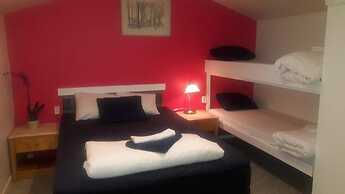 Milano Garden - City Bungalow Hotell, i gränssnittet till Kullabygdens