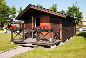 Milano Garden - City Bungalow Hotell, i gränssnittet till Kullabygdens