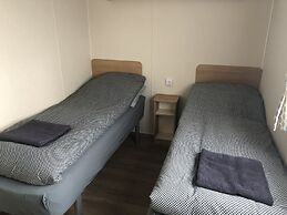 Lækjarkot Rooms and Cottages with Kitchen