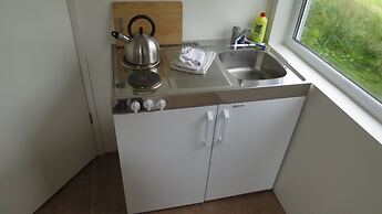 Lækjarkot Rooms and Cottages with Kitchen