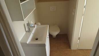 Lækjarkot Rooms and Cottages with Kitchen