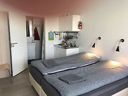 Lækjarkot Rooms and Cottages with Kitchen