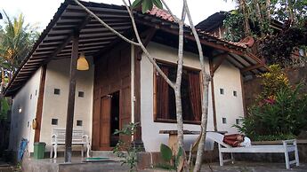 The Riverside Javanese Cottages