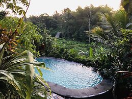 The Riverside Javanese Cottages