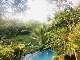 The Riverside Javanese Cottages