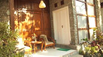 The Riverside Javanese Cottages