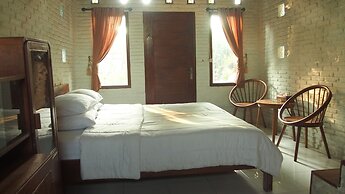 The Riverside Javanese Cottages