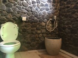 The Riverside Javanese Cottages