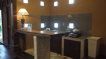 The Riverside Javanese Cottages