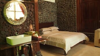 The Riverside Javanese Cottages
