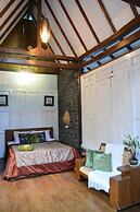 The Riverside Javanese Cottages