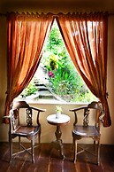 The Riverside Javanese Cottages