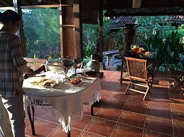The Riverside Javanese Cottages