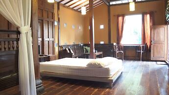 The Riverside Javanese Cottages