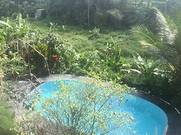 The Riverside Javanese Cottages