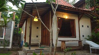The Riverside Javanese Cottages