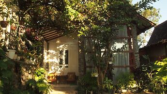The Riverside Javanese Cottages