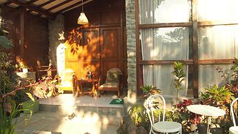 The Riverside Javanese Cottages