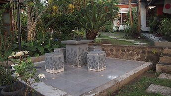 The Riverside Javanese Cottages