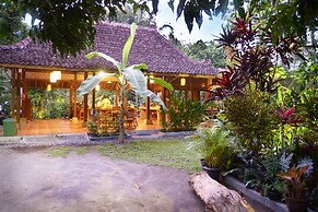 The Riverside Javanese Cottages