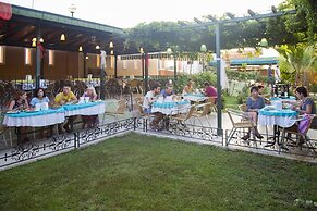 May Garden Club Hotel