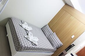 Shell Residences Apartment by Homebound