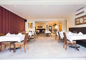 Earl Heights Suites Hotel